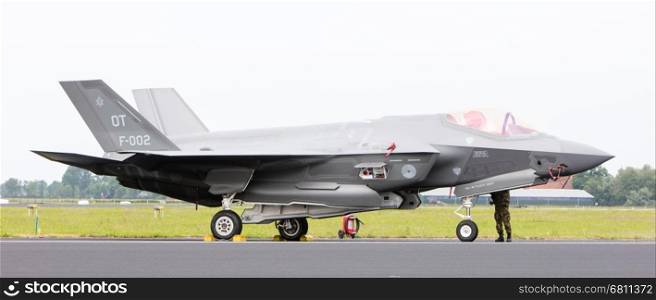 LEEUWARDEN, THE NETHERLANDS - JUNE 10, 2016: Dutch F-35 on the runway during a flyby on it's European debut at the Royal Netherlands Air Force Days