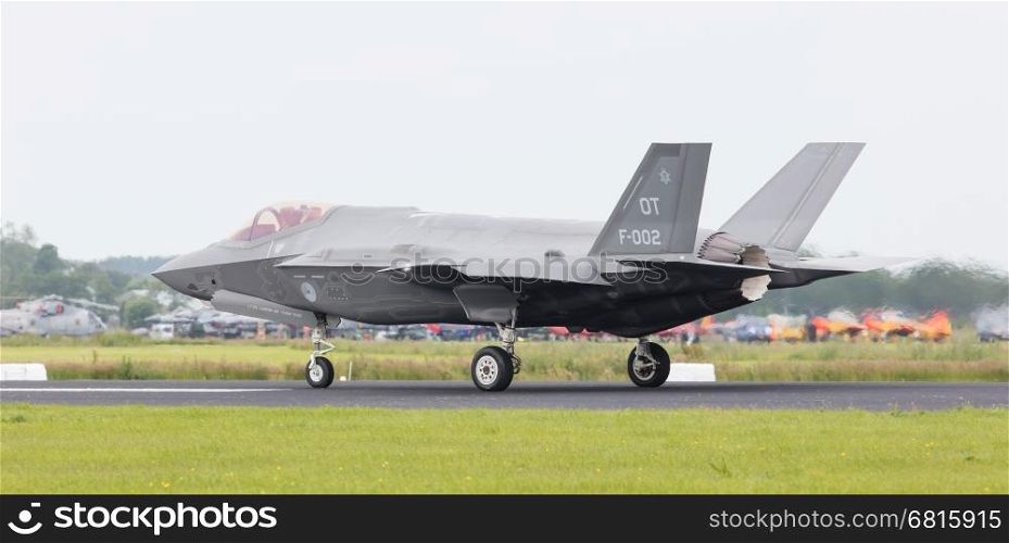 LEEUWARDEN, THE NETHERLANDS - JUNE 10, 2016: Dutch F-35 on the runway during a flyby on it's European debut at the Royal Netherlands Air Force Days