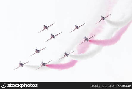 LEEUWARDEN, THE NETHERLANDS - JUNE 10, 2016: RAF Red Arrows performing at the Dutch Air Force Open House on June 10, 2016 at Leeuwarden Airfield, The Netherlands.