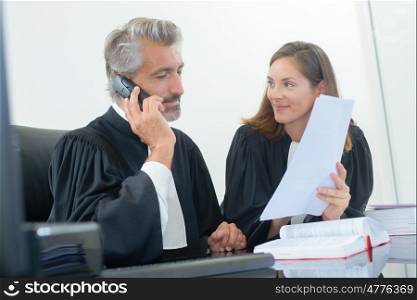 Legal worker using telephone