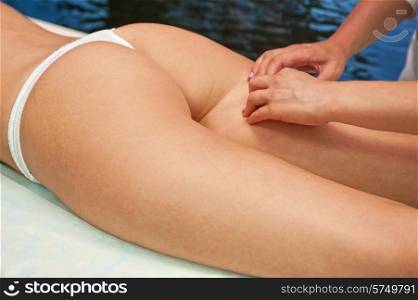 Legs and buttocks woman massage to reduce cellulite. woman massage