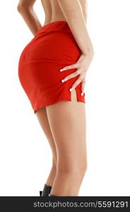 legs and hips of tanned lady in red skirt