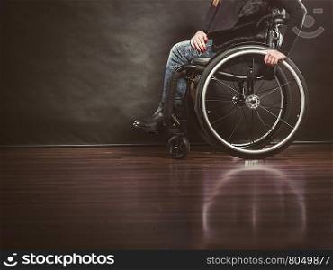 Legs of disabled person.. Disease disability paralysis handicap health concept. Legs of disabled person. Crippled female sitting on wheelchair.