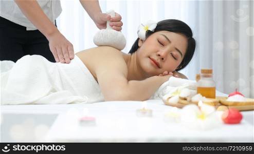 Leisure asian young woman in spa salon. Massage and treatment spa room.