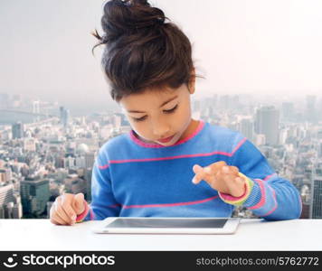 leisure, childhood, technology and people concept - little girl with tablet pc over city background