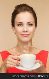 leisure, happiness and drink concept - smiling woman in red dress with cup of coffee