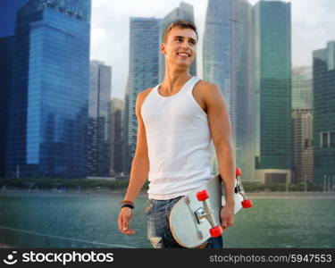 leisure, summer, sport, holidays and people concept - smiling teenage boy with skateboard over singapore city background