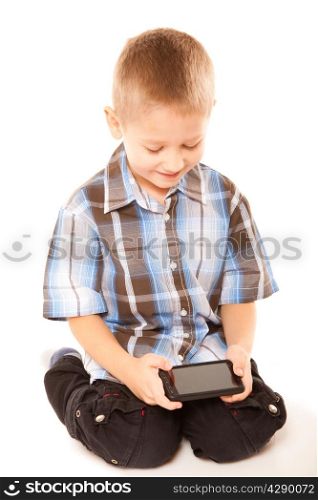 Leisure, technology and internet concept - little boy with smartphone playing games or reading text message
