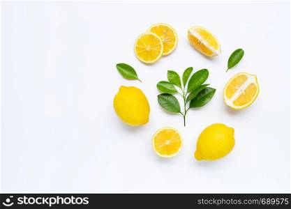 Lemon and slices with leaves isolated on white background. Copy space