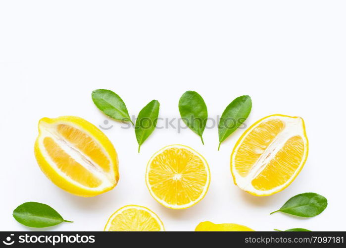 Lemon and slices with leaves isolated on white background. Copy space