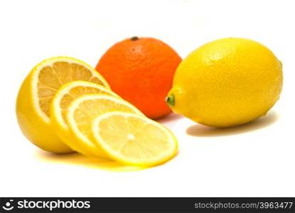 lemon and tangerine close-up on white