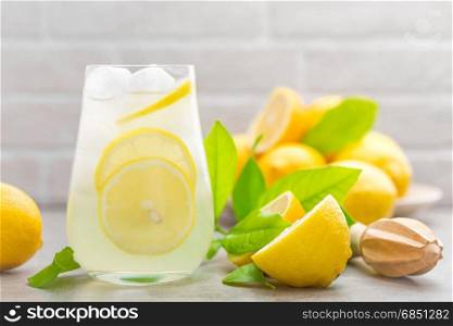 Lemon cocktail with juice and ice.