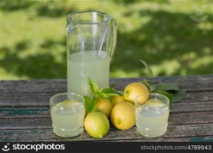 lemon juice on a wooden table, autumn set, outdoor