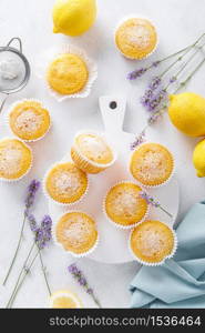 Lemon muffins with sugar powder