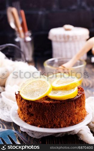 lemon pie with fresh lemons on a table