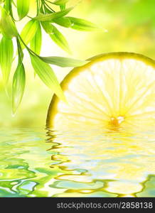 Lemon reflected in water