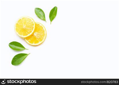 Lemon slices with leaves isolated on white background. Copy space