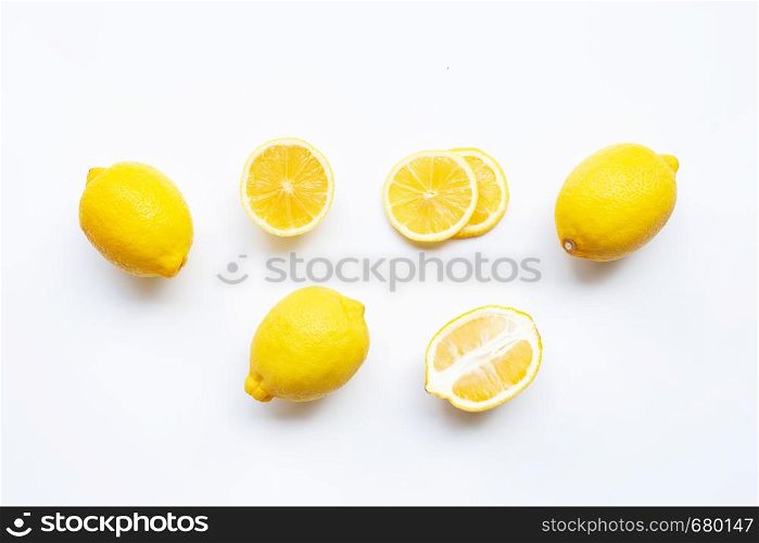 Lemon with slices isolated on white background.