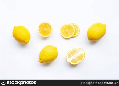 Lemon with slices isolated on white background.