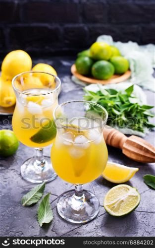 lemonad in glasses and on a table