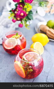 lemonad with raspberry on a table, stock photo