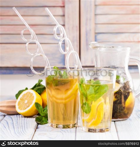 Lemonade on the table in the kitchen. Lemonade in glass