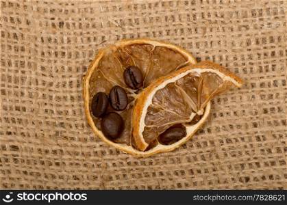 lemons and coffee beans on burlap