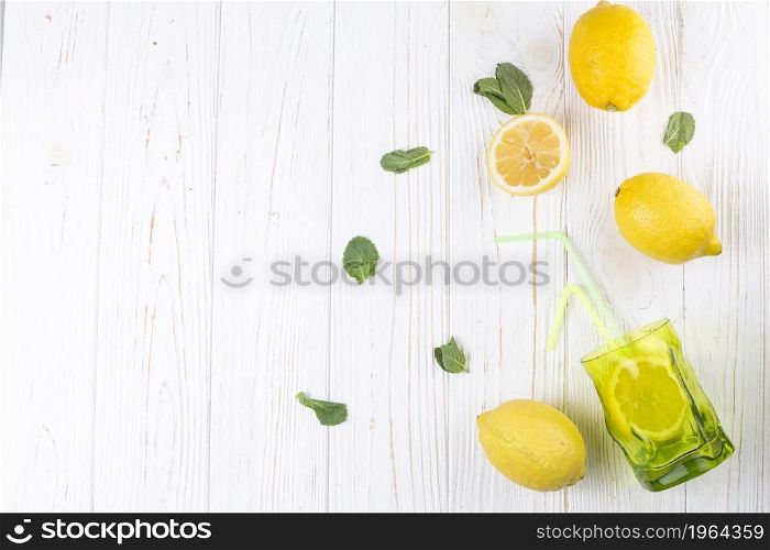lemons bright colored glass with straw. High resolution photo. lemons bright colored glass with straw. High quality photo
