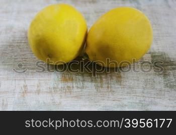lemons lying on the old Board. cut two lemons lie on the Board