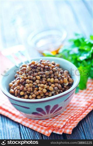 lentil in bowl and on a table