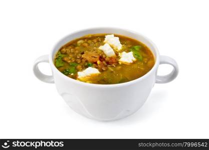 Lentil soup with spinach, tomatoes and feta cheese in a bowl isolated on white background
