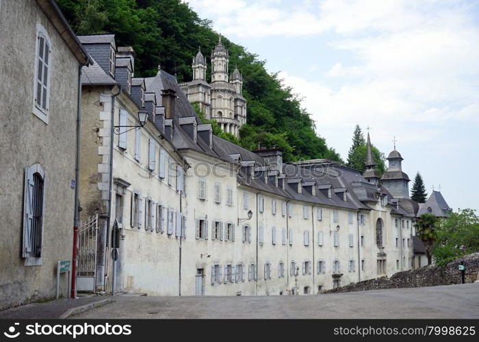 LESTELLE-BETHARRAM, FRANCE - CIRCA JULY 2015 Monastery and chapel on the hill