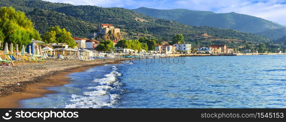 Lesvos island . Greece. Beautiful coastal village Petra with famous monastery over the rock and great beach. Greece summer holidays. Lesvos island, Petra