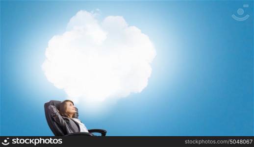 Let me think it over. Thoughtful businesswoman in chair and cloud bubble above her head