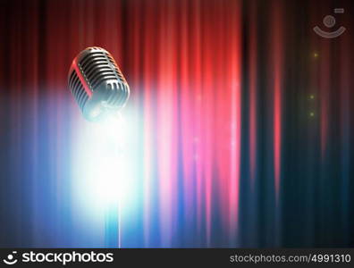 Let&rsquo;s sing! Stylish retro microphone on a colored background. Let&rsquo;s sing!