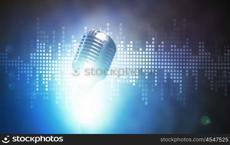 Let's sing! Stylish retro microphone on a colored background