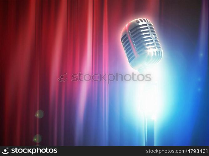 Let's sing! Stylish retro microphone on a colored background