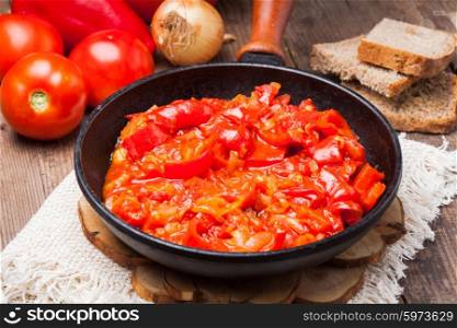letcho ingredients and dish in rustic pan. letcho