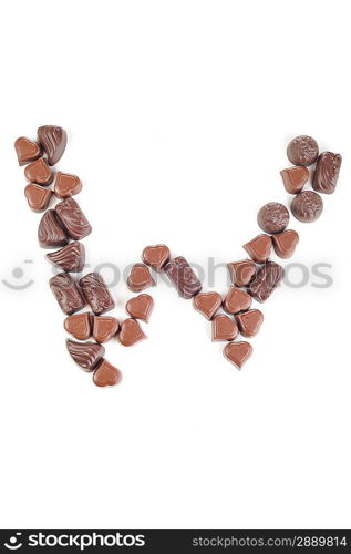 letter from chocolates on white background