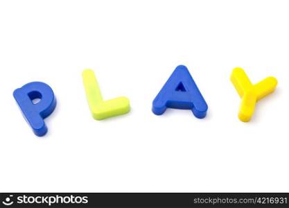 "Letter magnets " play" closeup on white background "