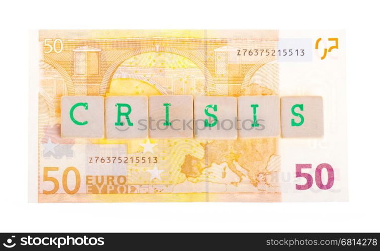 Letter on blocks on top of a 50 euro banknote
