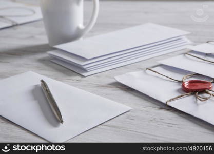 Letter with seal on table. Old post concept with envelope with wax seal on wooden surface