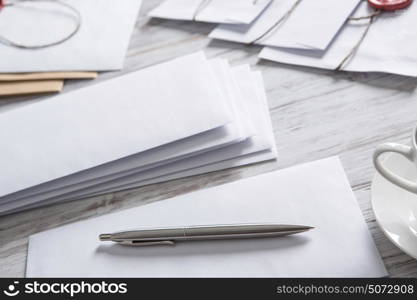 Letter with seal on table. Old post concept with envelope with wax seal on wooden surface