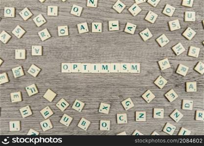 letters forming word optimism