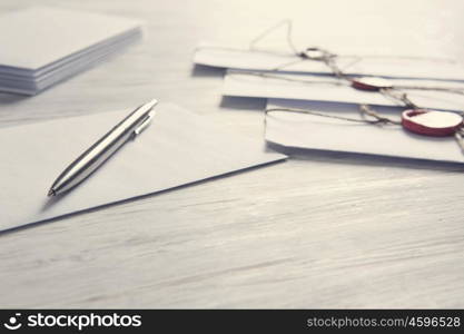 Letters with seal on table. Old post concept with envelope with wax seal on wooden surface