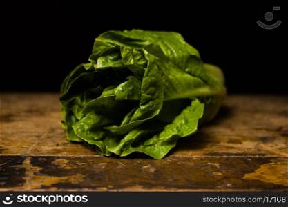 lettuce on wooden surface