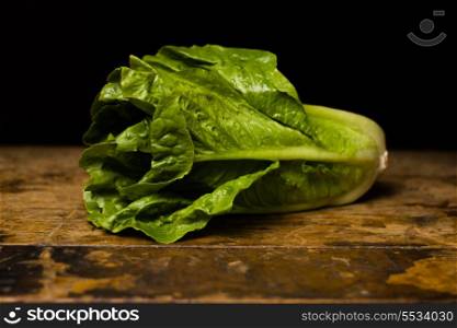 lettuce on wooden surface