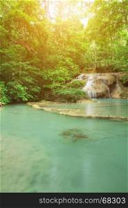 Level 1 of Erawan Waterfall with Neolissochilus stracheyi fish in Kanchanaburi Province, Thailand
