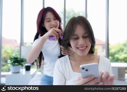 LGBT couple helping couple comb their hair after waking up take a shower before heading out to nature travel the countryside.