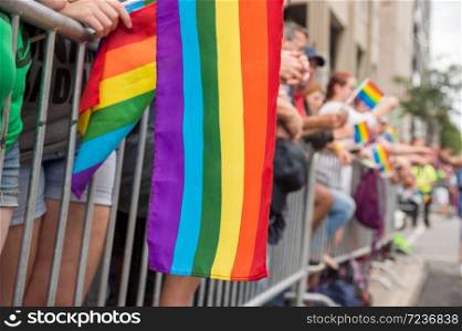 LGBT parade and celebration. Gay rainbow flags at Montreal gay pride parade